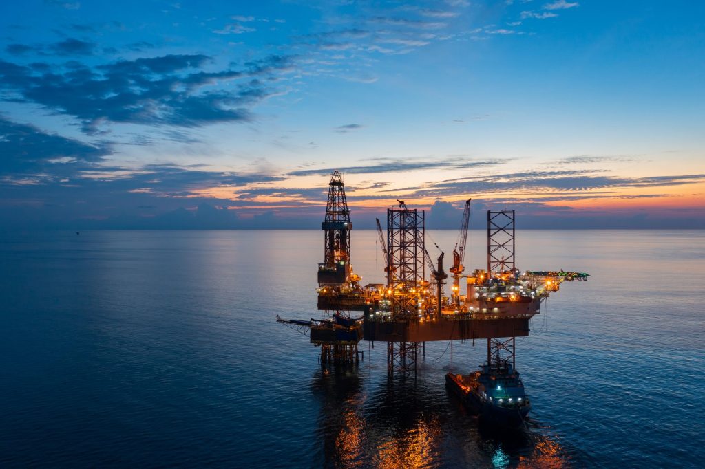 Offshore oil and gas platform at dusk